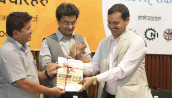 Hon. Rabindra Adhikari hands over 'Ideas for Rebuilding Nepal' to Hon. VC of National Planning Commission
